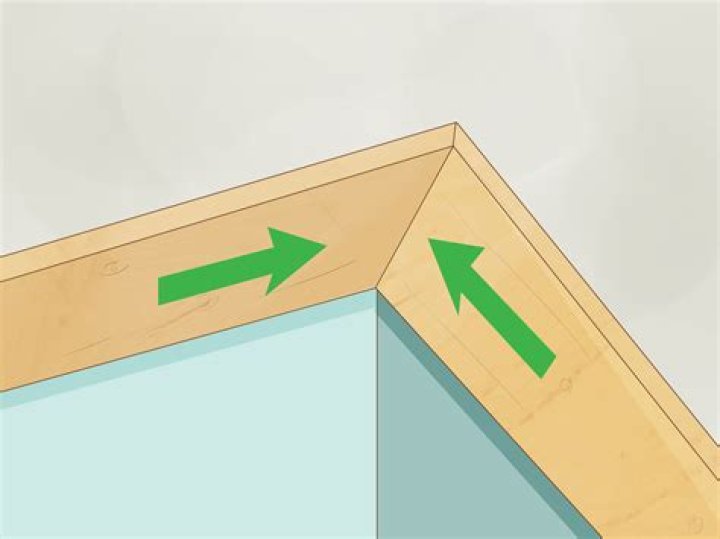How do you cut a 45 degree corner on crown molding?