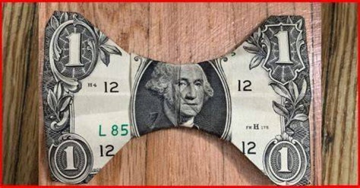 How do you tie a dollar into a bow tie?