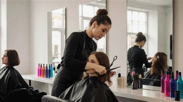 What do you call a woman that cuts hair?