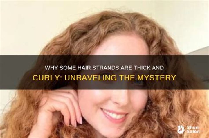 Why are some strands of my hair a different color?